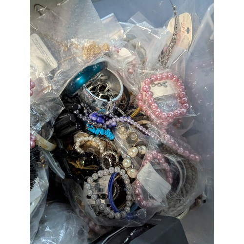 639 - Large box of costume jewellery inc. bracelets, tiaras, jewellery display stands etc., many new and s... 