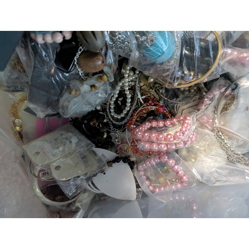 639 - Large box of costume jewellery inc. bracelets, tiaras, jewellery display stands etc., many new and s... 