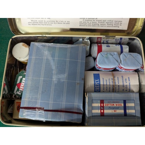 646 - Reader's Digest First Aid box and various contents