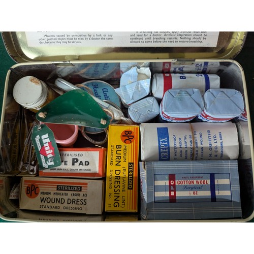 646 - Reader's Digest First Aid box and various contents