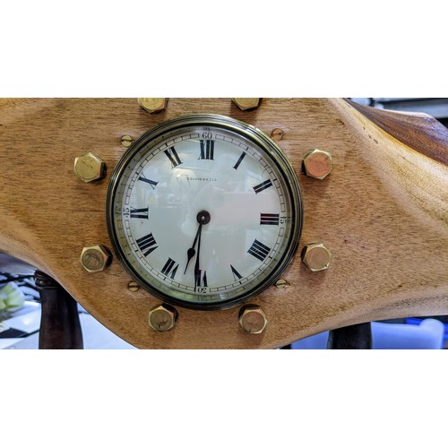 10 - Collingwood clock mounted in a wooden propeller boss, dated November 1939. Brass plate to top marked... 