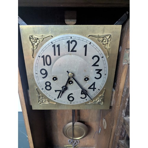 47 - Wall clock. Pendulum and key both present. Marked D.R.P. to rear but unable to see serial number wit... 