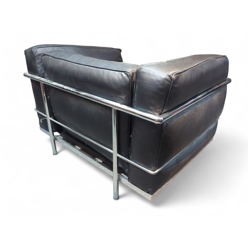 68 - Le Corbusier-style armchair in black leather. W98cm D73cm H64cm.