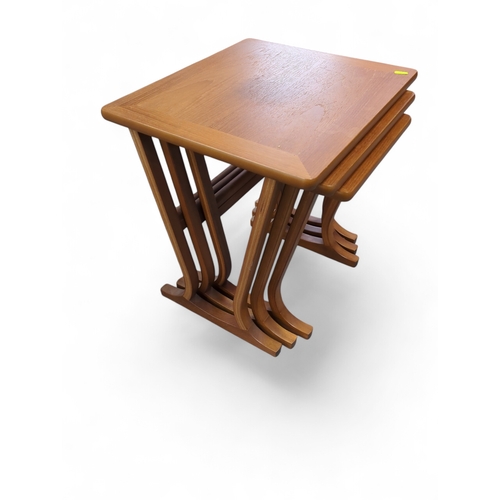 78 - Nest of three Parker knoll tables model 5654. Largest 48cm by 42cm by 48cm