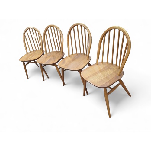 129 - Set of 4 beech and elm Ercol Windsor dining chairs.