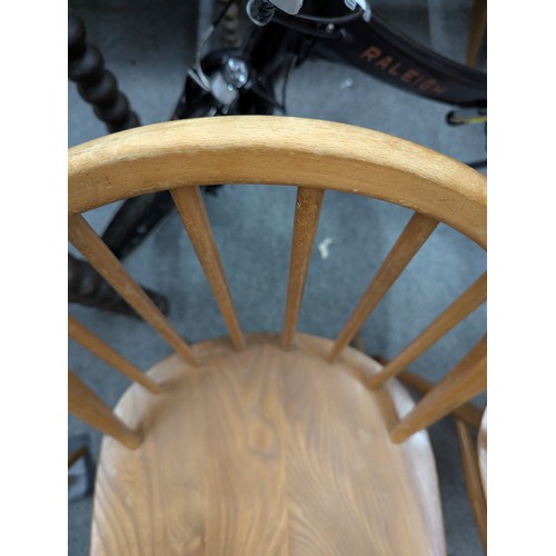 129 - Set of 4 beech and elm Ercol Windsor dining chairs.