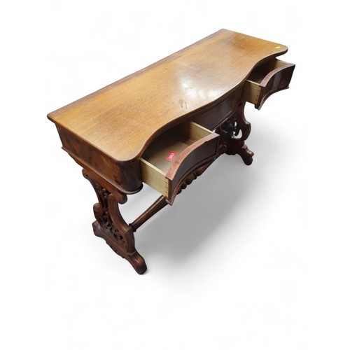 135 - Serpentine hallway table with two drawers. Marked B. Taylor & Sons. Gt. Dover Street London. W10... 