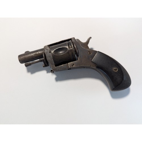 595 - Small five shot revolver, checkering to ebonised handle, bears proof mark, length 12cm