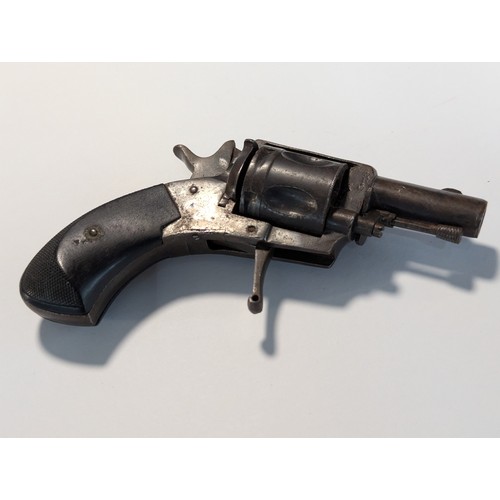 595 - Small five shot revolver, checkering to ebonised handle, bears proof mark, length 12cm