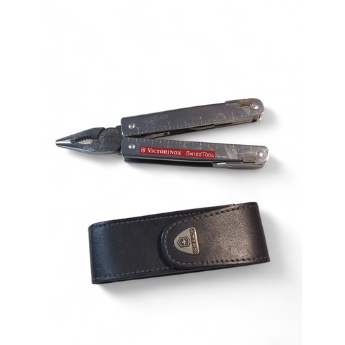 601 - Victorinox Swiss tool multi tool in leather pouch