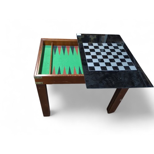 189 - Reversible games table (chess draughts and backgammon) + instructions and pieces. W41cm L61cm H50cm.