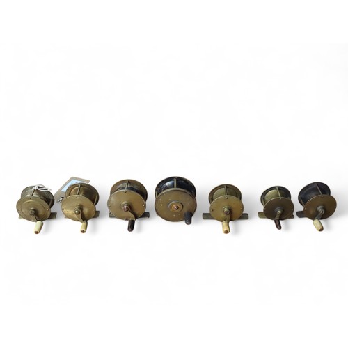 201 - 7 x small brass fishing reels