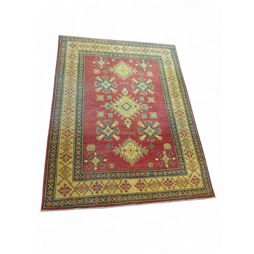 275 - Pakistan geometric Kazak rug. 131cm by 176cm