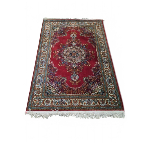 276 - Atlas halilari central medallion red rug 122cm by 200cm