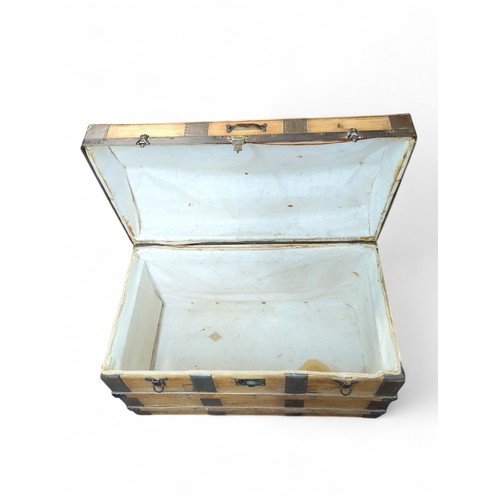 374 - Metal-bound travel chest. W93cm D51cm H63cm.