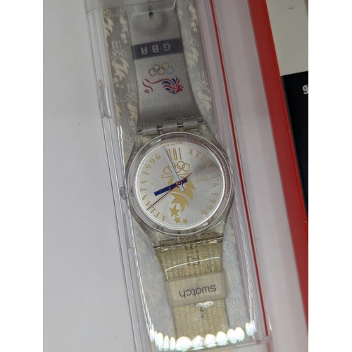 572 - Swatch GBR Olympic Team Atlanta 1996 watch with case and outer sleeve