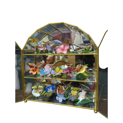 103 - Franklin Mint glazed cabinet containing 15 ceramic butterflies.