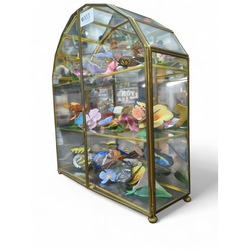 103 - Franklin Mint glazed cabinet containing 15 ceramic butterflies.