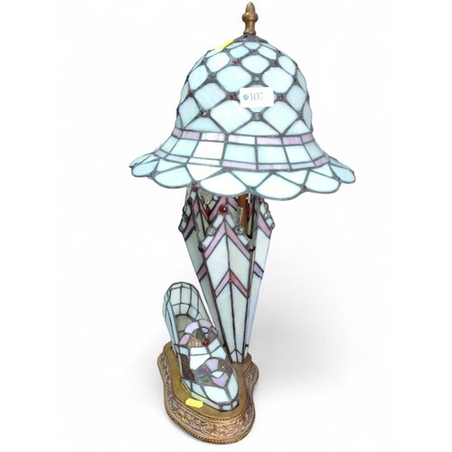 107 - Tiffany-style lamp in the form of shoe, umbrella and hat. Overall height 58cm.