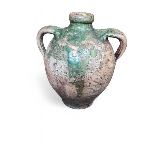 297 - Green glazed terracotta olive oil jar, height 26cm