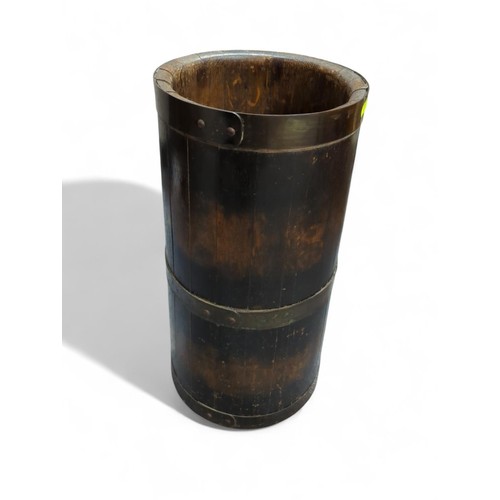 81 - Wooden umbrella stand with brass banding. H51cm. 