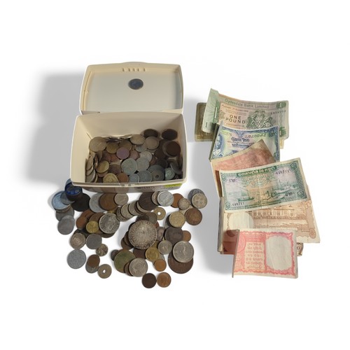 585 - Tub of assorted British & world coins and banknotes, including small quantity of silver, Maria T... 