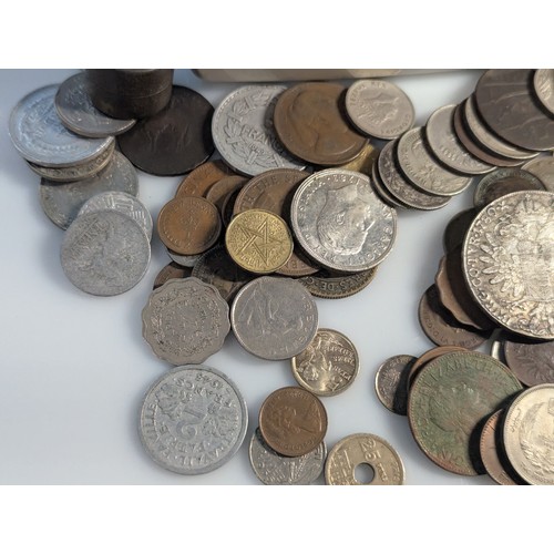 585 - Tub of assorted British & world coins and banknotes, including small quantity of silver, Maria T... 