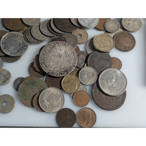 585 - Tub of assorted British & world coins and banknotes, including small quantity of silver, Maria T... 