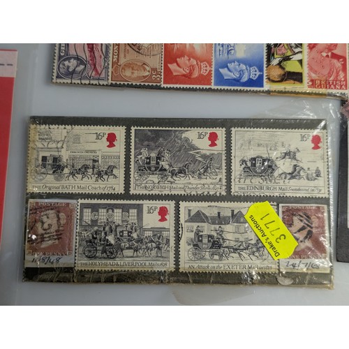 587 - Small quantity of presentation packs and used stamps