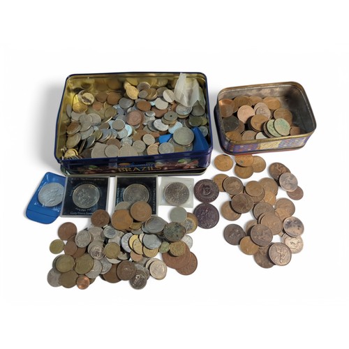 588 - Two tins of British and world coins, gross weight including tins 4.3kg