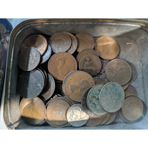 588 - Two tins of British and world coins, gross weight including tins 4.3kg