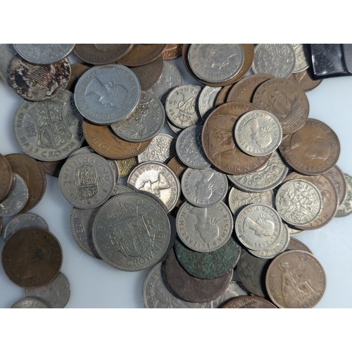 589 - Collection of British and world coins, stamps, cigarette cards etc., gross weight 970 grams