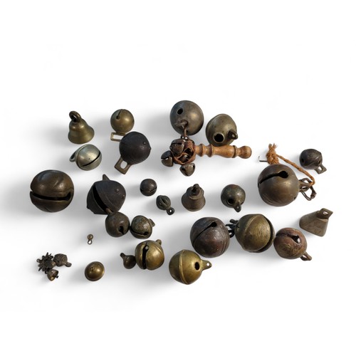 591 - Box of assorted crotal and other bells, including a crotal bell marked RW for Robert Wells