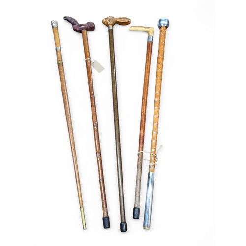 611 - Five various walking sticks, including Late Victorian silver topped hallmarked Birmingham 1897, hare... 