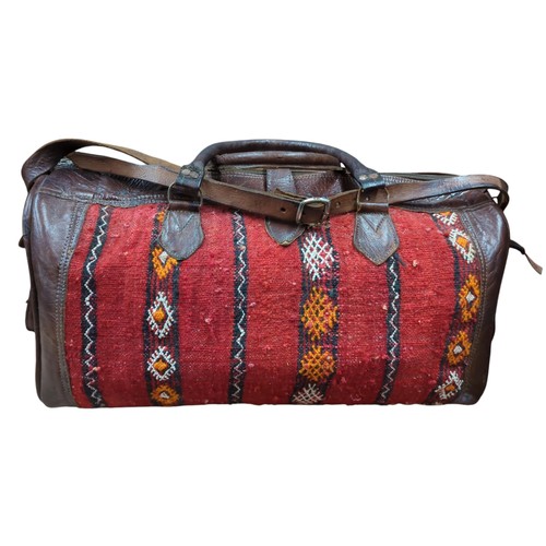 187 - Moroccan leather & kilim travel bag. L56cm