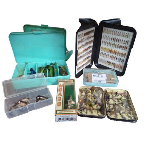 202 - Large collection of fishing flies, fly cases, lures and line.