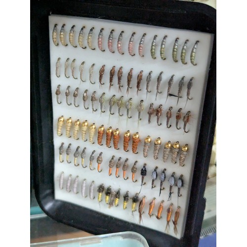 202 - Large collection of fishing flies, fly cases, lures and line.