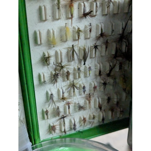 202 - Large collection of fishing flies, fly cases, lures and line.