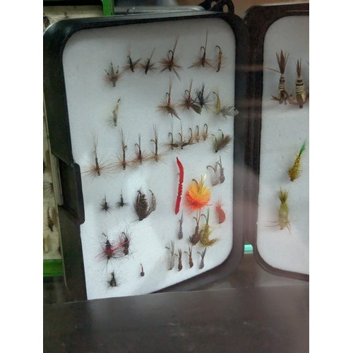 202 - Large collection of fishing flies, fly cases, lures and line.