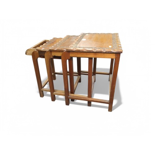 163 - Nest of 3 teak tables, smallest with drawer. Largest table size W41cm D28cm H40cm