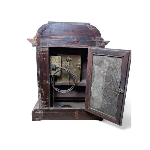 328 - Carved wood cased mantle clock, unmarked, with pendulum, height approx. 38cm