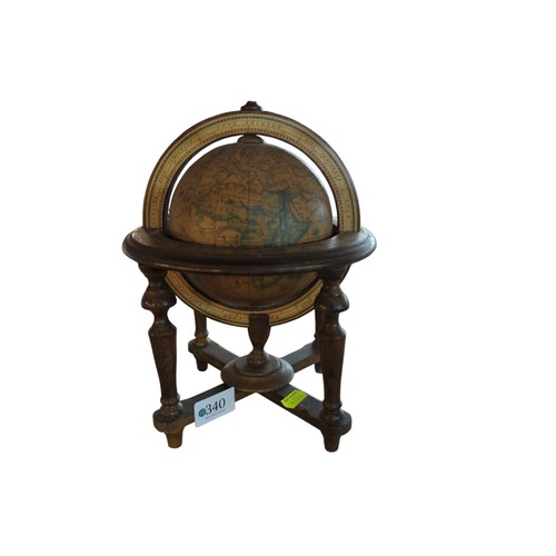 340 - Small wooden globe with adjustable axis. 