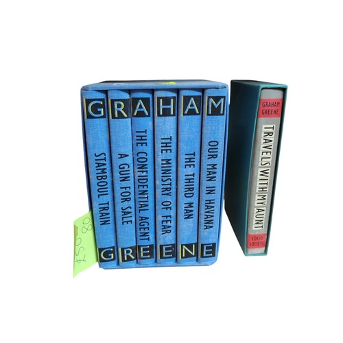 366 - A selection of 7 books by Graham Greene from The Folio Society: Travels With My Aunt, Stamboul Train... 