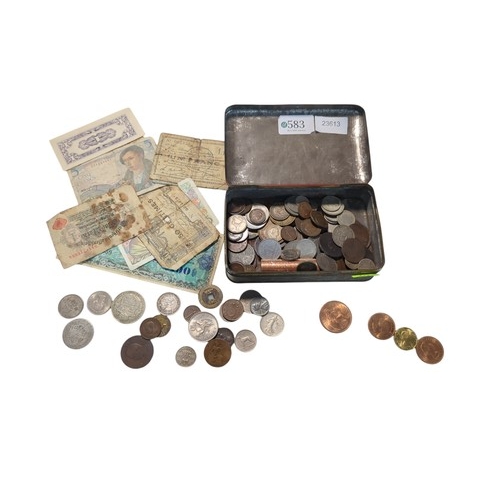 583 - Tin of assorted coins and banknotes, including some silver, gross weight including tin 700 grams