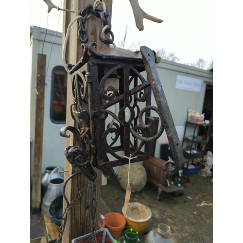 72 - Metal hanging lamp with bracket and door knocker.