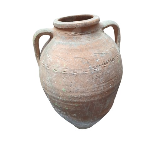 Large terracotta Mediterranean-style amphora. H58cm. Dia of rim 18cm.
