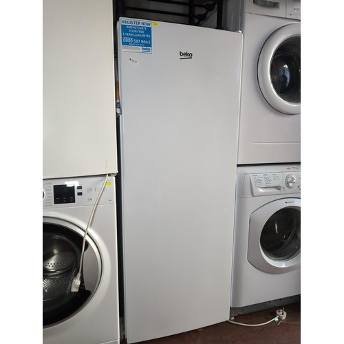 1357 - Beko Tall Fridge W 55cm. D 55cm. H 145cm