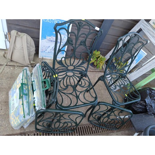 13 - 2 green aluminium garden chairs with 4 cushions + 2 extra backs and seats but no legs. 