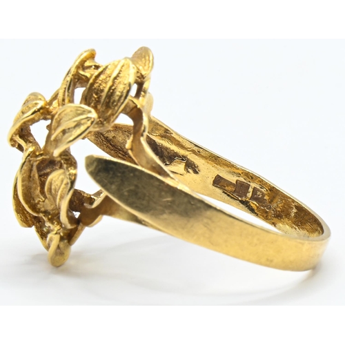 5 - High grade yellow metal stylised leaves ring, stamped 750 with Arabic marks, size O, 4.92 grams... 