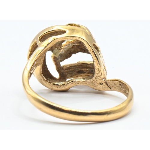 9 - High grade yellow metal open work ring with crescent, stamped 750, size M, 4.2 grams